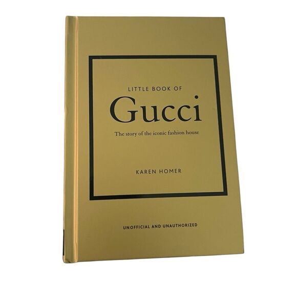 Gucci Gold Hardcover Book - Picture 1 of 6
